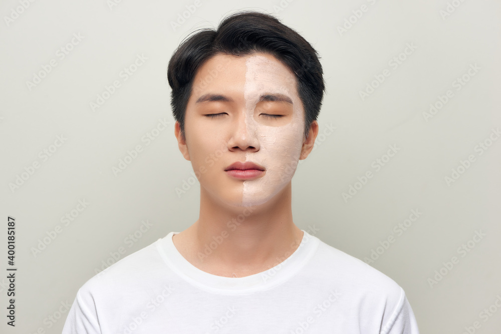 Front portrait of a white male wearing a mud mask beauty treatment. Front portrait of a white male wearing a mud mask beauty treatment.