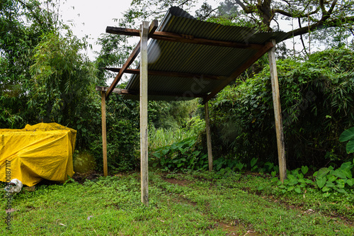 Picture of sheller beside in agricultural field in Indian village. photo