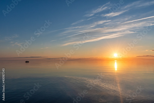 Sunset on the lake in summer, Pskov region