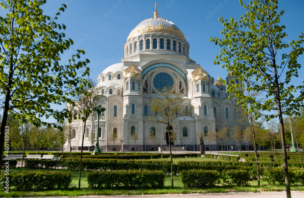 Naval Cathedral of St. Nicholas the Wonderworker. Neo-Byzantine style, the largest, blue and gold dome, green park. Kronshtadt, Saint Petersburg, Russia.