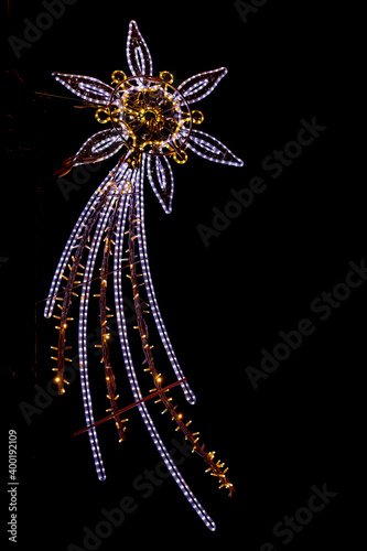 light illumination of the Star of Bethlehem on a black smooth background © Joanna Redesiuk