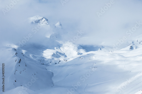 Mountains blanketed by fresh snow.