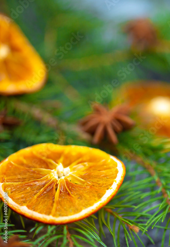 Festive background for the new year 2021. Christmas tree on the table with dried fruits and spices  background for New Year s recipes. Elegant card decor for Christmas greetings.