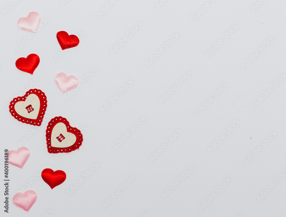 Valentine day greeting card or banner. Red hearts on white background top view. Flat lay