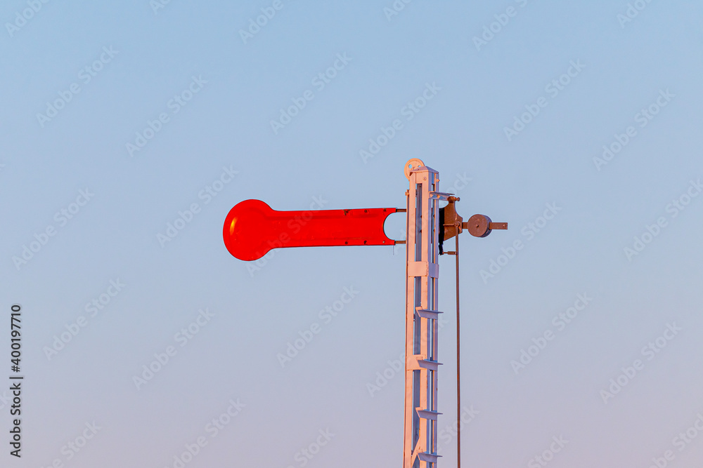 Old railway mechanical semaphore on blue sky background Old railway mechanical semaphore on blue sky background