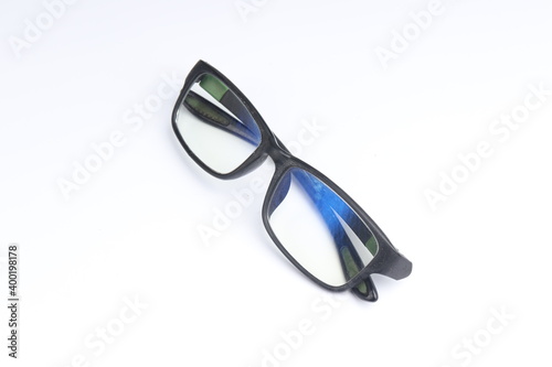 clear glasses with black frame on isolated white background. fashion and eye health products. sport glasses with a rubber base material