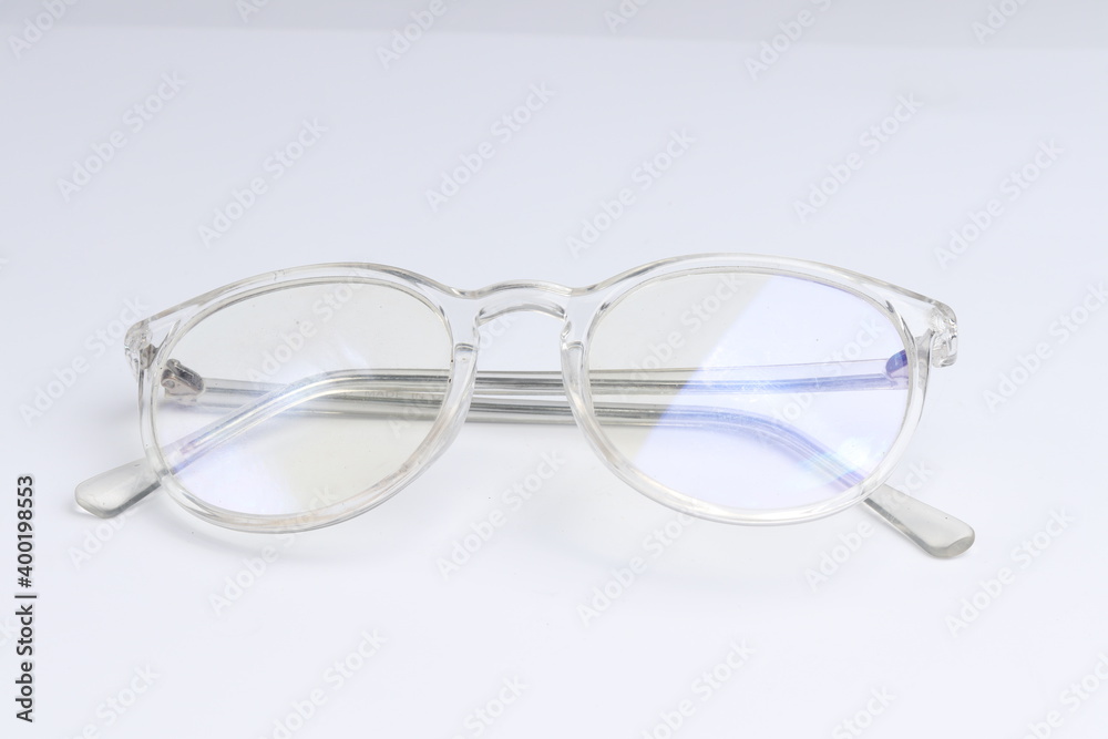 Fototapeta premium transparent clear glasses on isolated white background. fashion and eye health products