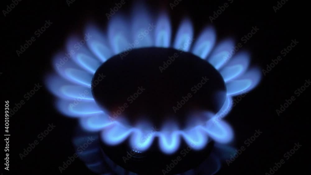 Gas Stove Turned On and Off with Blue Flames Fire in the Dark Gas Stove Turned On and Off with Blue Flames Fire in the Dark
