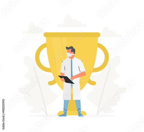 The doctor stands in front of gold trophy cup. Choose best doctor for consultation.
