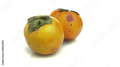 kingler persimmon isolated on white background photo