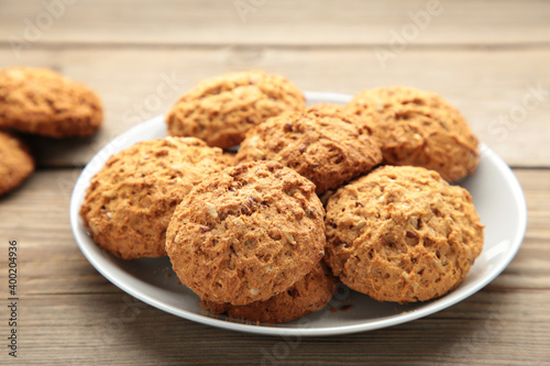 Stack of cookies on the plate on grey background