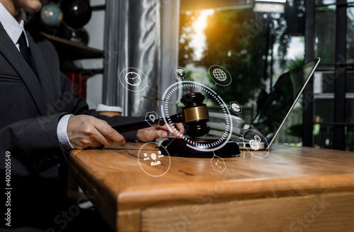 Concepts of Law and Legal services. Lawyer business hands working with law interface icons at table office. technology and lawyer. 