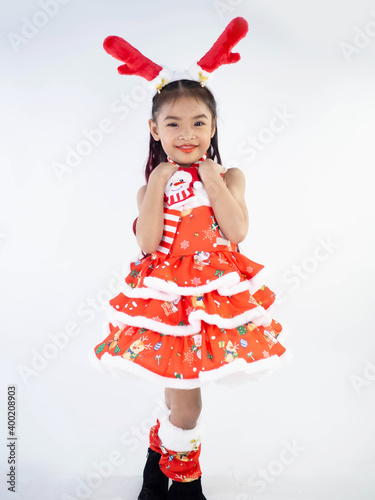 Merry Christmas girl Wearing Santa claus suit on white background