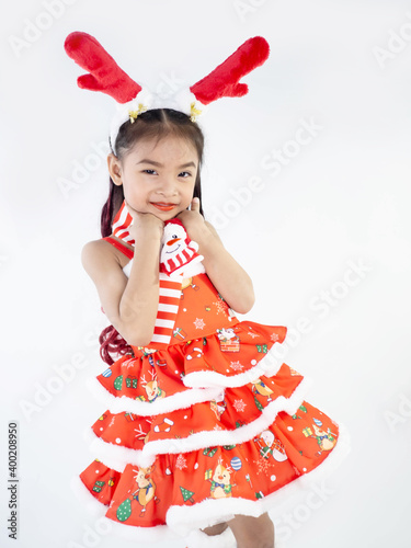 Merry Christmas girl Wearing Santa claus suit on white background
