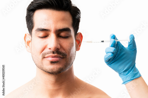 Man going through skin care and aesthetic medical therapy