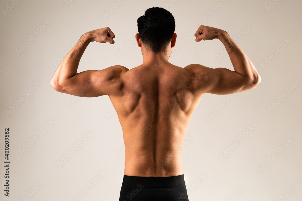 Athlete showing muscular back