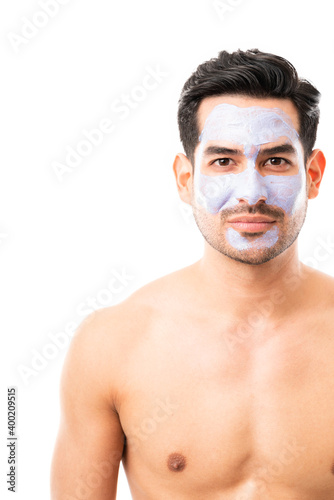 Young man with facial mask