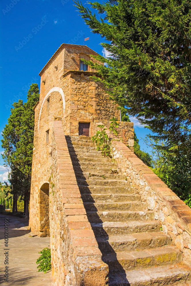 The fifteenth century Porta Cappuccini, one of the gates to the historic medieval village of San Quirico D'Orcia, Siena Province, Tuscany, Italy. Also known as the Gate of the Capuchin Friars
