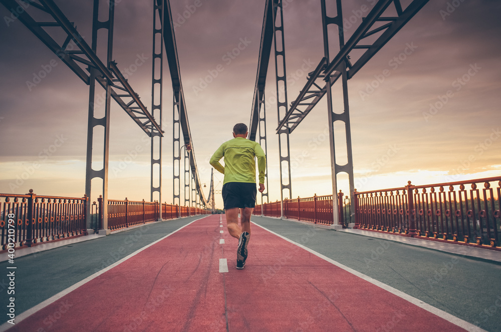 custom made wallpaper toronto digitalsporty man running outdoors on the bridge during sunrise