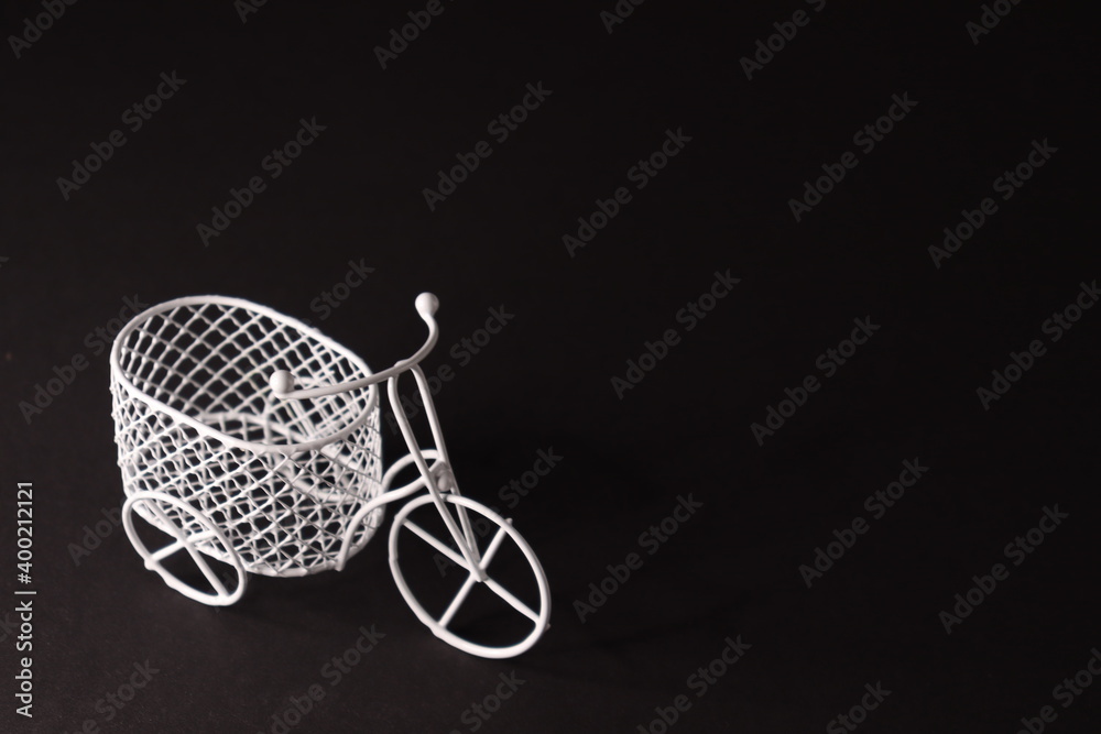 White bicycle on black background. White bicycle on black background.