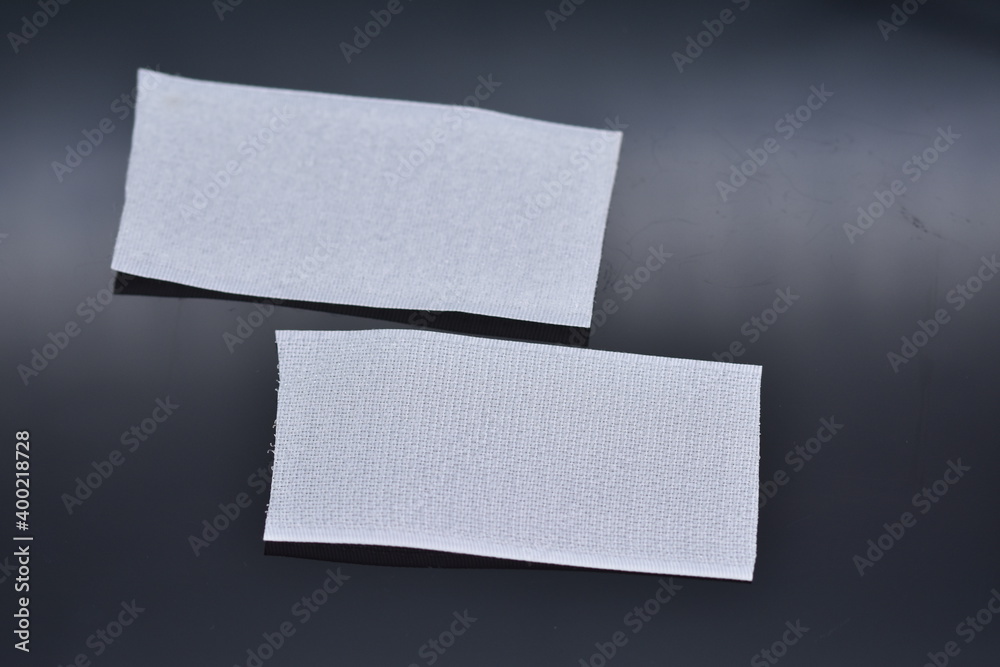 white Velcro tape isolated on black white Velcro tape isolated on black