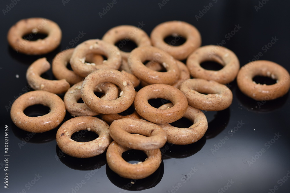 Pretzels crackers bagels with wine,crispy goodies with lemon and pepper Pretzels crackers bagels with wine,crispy goodies with lemon and pepper