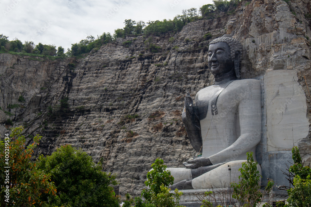 A monk made of stone.Buddha.cliff