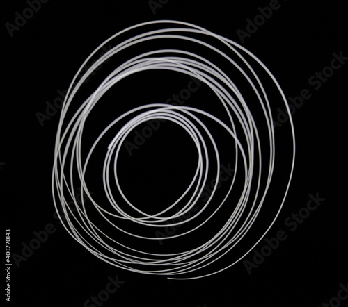 White glow illuminated swirl circle