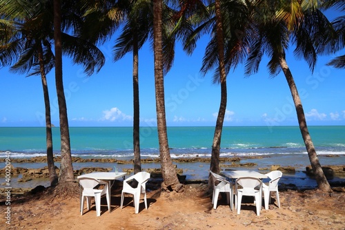 Seaside outdoor cafe tables photo