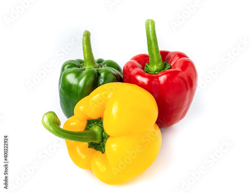three bell peppers isolated on white background. Fresh vegetables Three sweet Red, Yellow, Green Peppers. vegan food concept. healthy eating