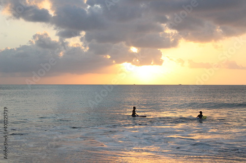 sunset and kids on the beach © kelvin