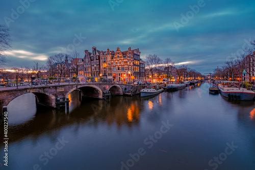 Amsterdam canals Netherlands, Amsterdam Holland during sunset evening during wintertime in the Netherlands. Europe photo