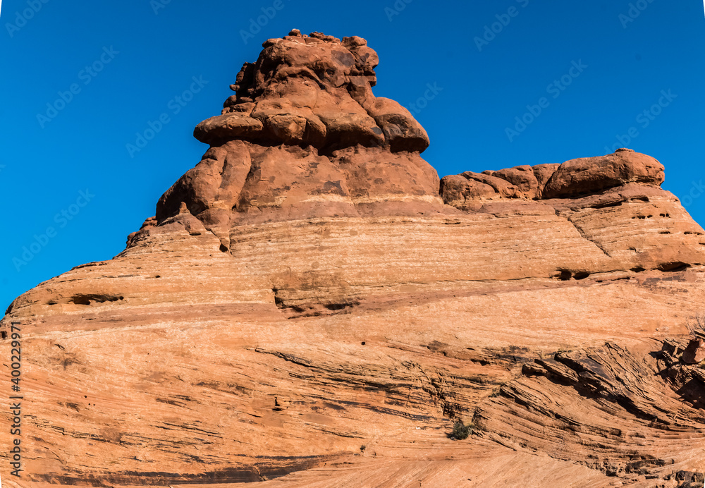 Sandstone Tower and Elephant Butte, The Garden of Eden, Arches National Park, USA Sandstone Tower and Elephant Butte, The Garden of Eden, Arches National Park, USA