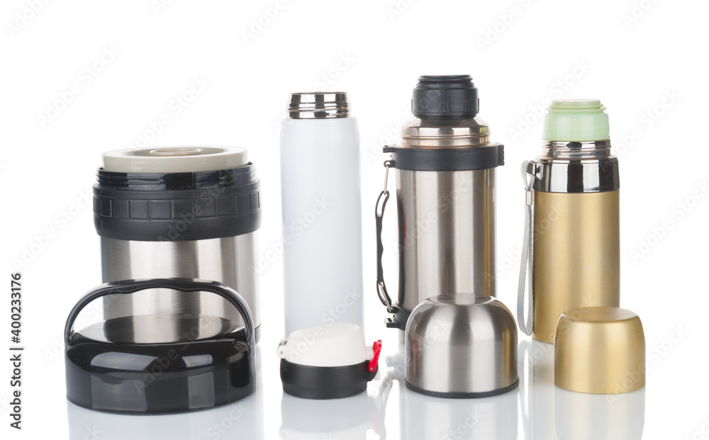 Four thermoses close up on white background