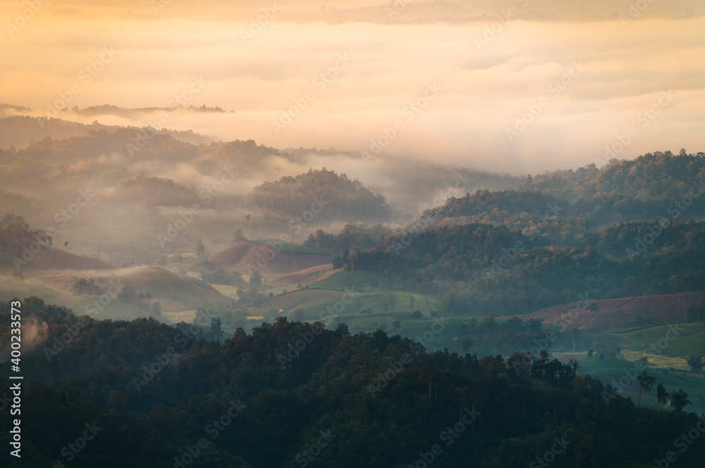 Fototapeta premium Beautiful sunrise mountain range in Tha Song Yang district located in Tak province, Thailand