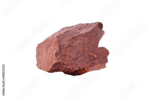 A piece raw specimen of red shale rock isolated on a white background.