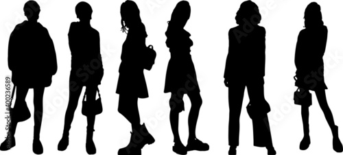 Vector silhouette of ladies with purse, front view perfect to include in your architecture projects, renders, sketches or plans.