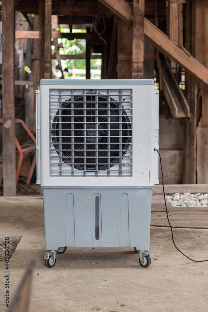 Evaporative Air Cooling Fan. Air conditioning. portable air cooler and humidifier on casters. Mobile air purifier. Evaporative Air Cooling Fan. Air conditioning. portable air cooler and humidifier on casters. Mobile air purifier.