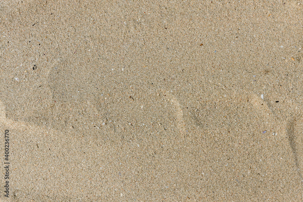 Natural sand stone texture background. sand on the beach as background. Art cream concrete texture for background in black. color dry scratched surface wall cover sand art abstract colorful relief. Natural sand stone texture background. sand on the beach as background. Art cream concrete texture for background in black. color dry scratched surface wall cover sand art abstract colorful relief.