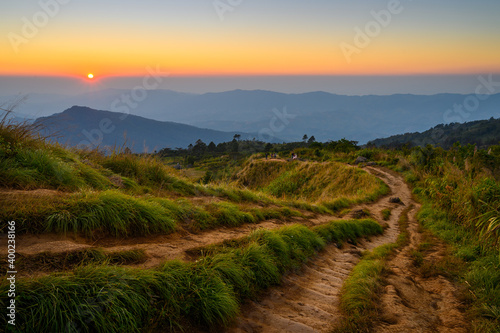 Beautiful mountain landscape at sunsest at Phu Chi fa or Phu Chee fah located in Chiang Rai province, Thailand photo