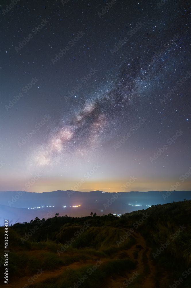 Milkyway and zodiacal light raise up scene at Phu Chi Fa mountain peak in Chiang Rai, Thailand