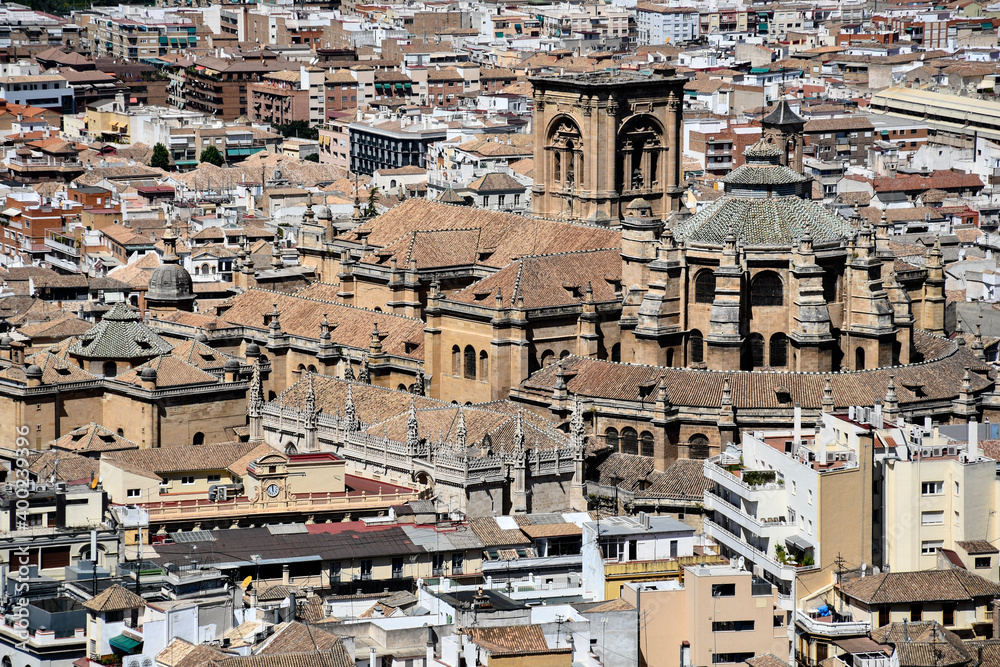 Aerial view of Granada Cathedral and the rooftops in the center of Granada in Andalusia, Spain, on a sunny day
