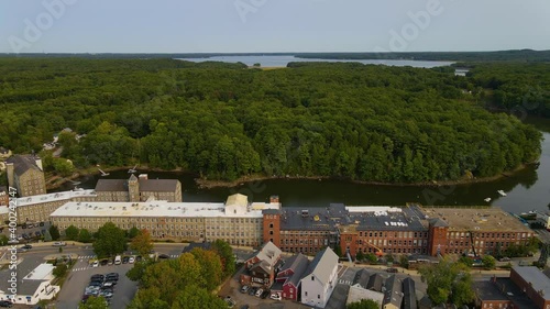 Newmarket town center aerial view at Main Street and Lamprey River with historic mills on the bank, Newmarket, New Hampshire NH, USA.  photo