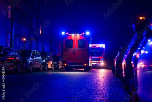 Ambulance at night, blue light, fire department, berlin, germany, out of focus photographed, abstract 