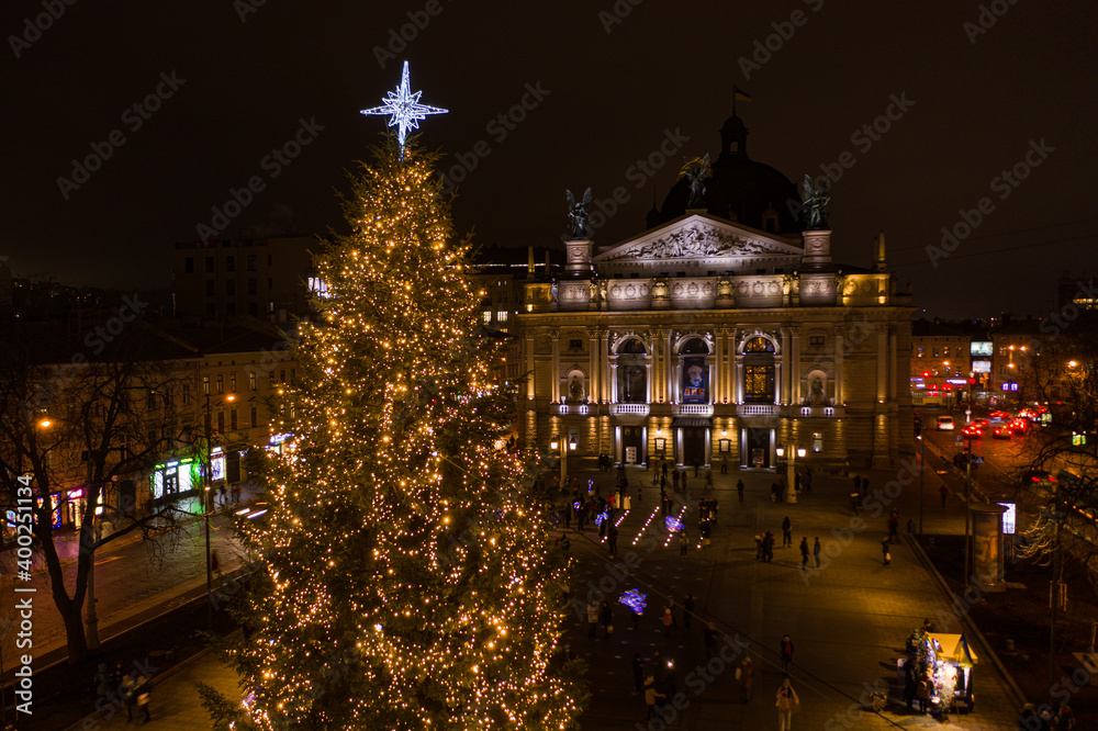 Opening of Christmas tree near Opera House in Lviv, Ukraine. View from drone