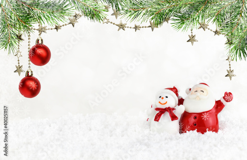 Santa Claus and snowman wit...