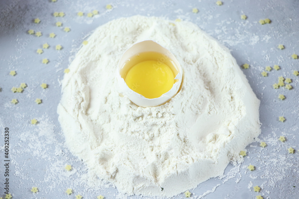 ingredients for homemade pasta. Food background: macaroni, spagetti, egg, flour ingredients for homemade pasta. Food background: macaroni, spagetti, egg, flour