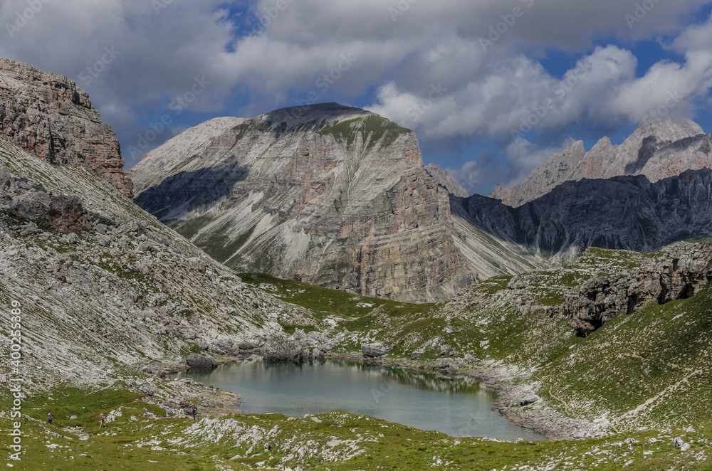 View of Crespeina lake, located west of Gardenacia plateau, as seen on High Route #2 from Puez refuge to Gardena valley, Puez-Odle Nature park, Dolomites, South Tirol, Italy. View of Crespeina lake, located west of Gardenacia plateau, as seen on High Route #2 from Puez refuge to Gardena valley, Puez-Odle Nature park, Dolomites, South Tirol, Italy.