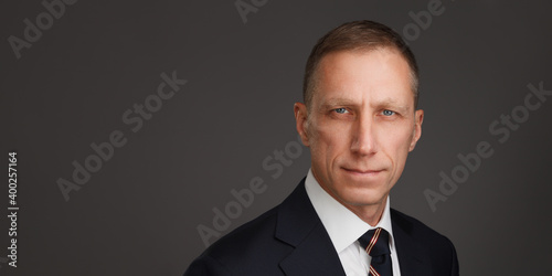 Well-groomed middle-aged man portrait. Male headshot