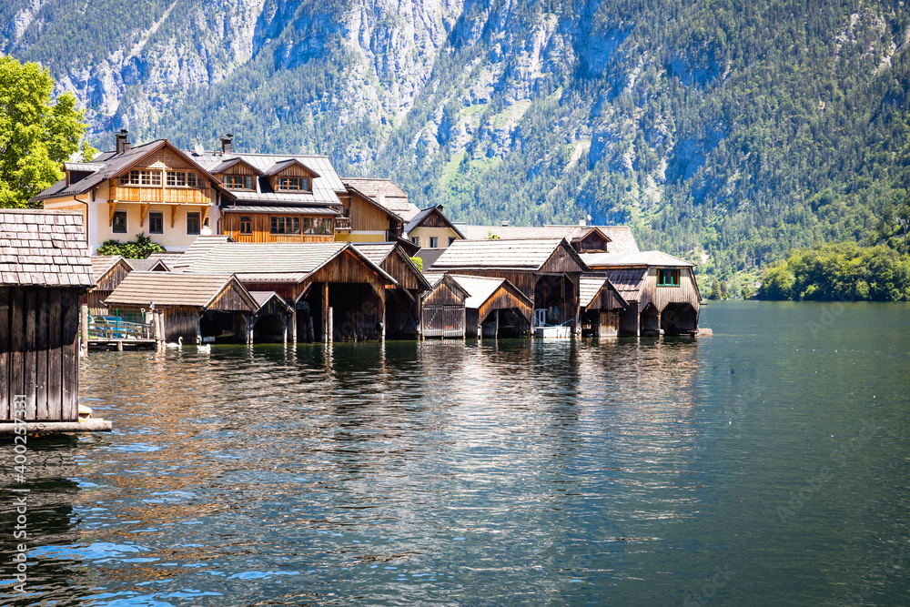 Old boat houses in Hallstatt, famous ancient village in Austria
